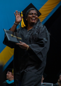 Student smiling at graduation