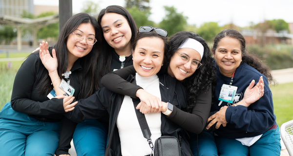 Students smiling on-campus