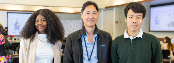 Smiling students with faculty