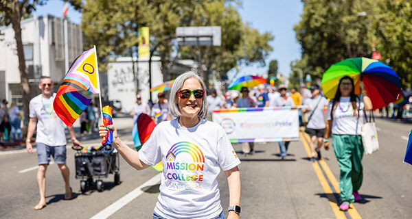 Woman holding pride flag 