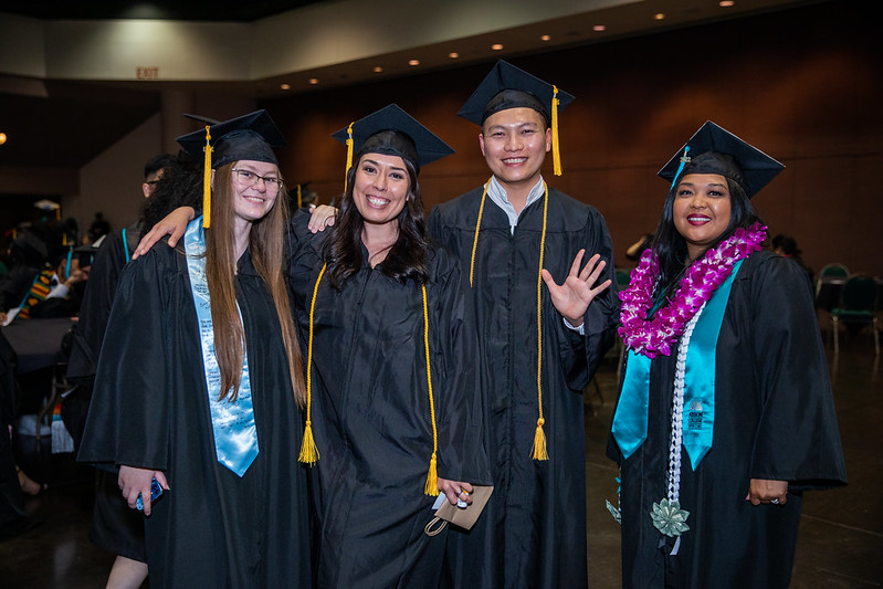 Four students at graduation